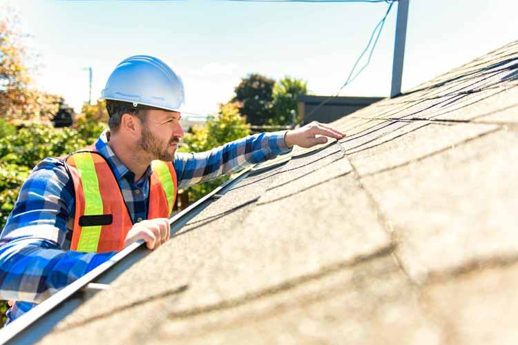 man-working-on-roof